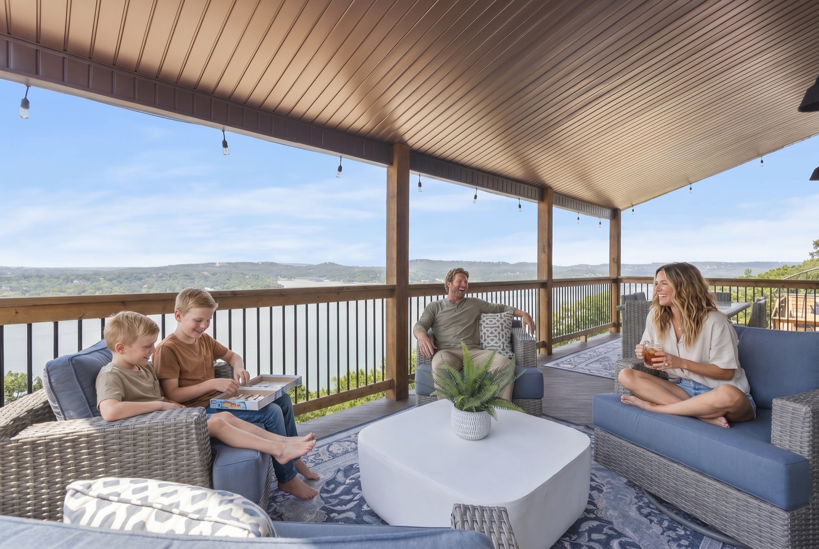 Family enjoying covered patio at a short-term rental